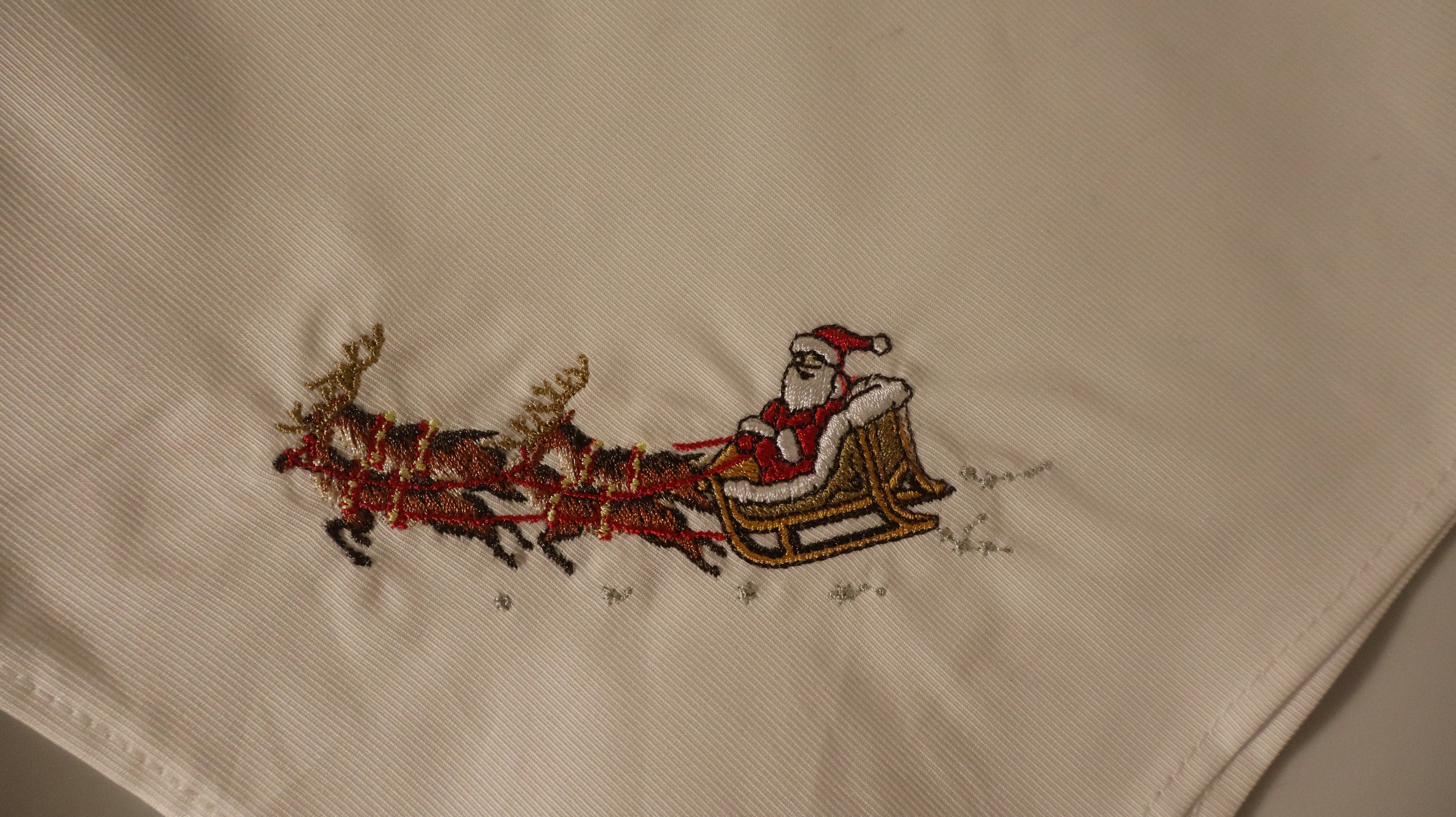 Serviette de table Père Noël et son traîneau